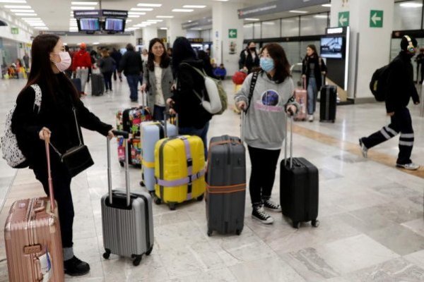 China pide a sus ciudadanos que cumplan requisitos de otros países para viajar frente a próxima reapertura de fronteras